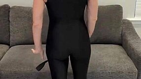 BLACK BODYSUIT HUGS CURVES WITH HOT HUNTER BOOTS ON!