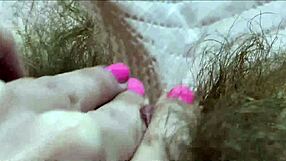 closeup view of huge clitoris getting rubbed to intense wet orgasm