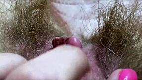 closeup view of huge clitoris getting rubbed to intense wet orgasm