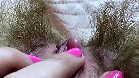 closeup view of huge clitoris getting rubbed to intense wet orgasm
