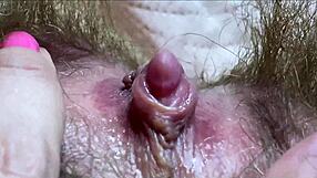 closeup view of huge clitoris getting rubbed to intense wet orgasm