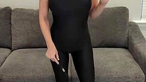 BLACK BODYSUIT HUGS CURVES WITH HOT HUNTER BOOTS ON!