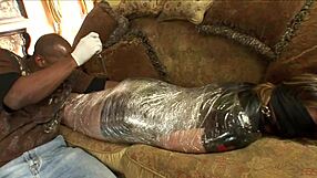 blindfolded white babe wrapped tight takes hung black cock deep in booty