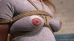 Bound Brunette Endures Intense Spanking to Crimson Ass