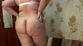 big fat milf bends over mirror shoving dildo deep in doggy pussy!