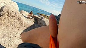 Petite Italian brunette teen flashes thong panties topless on beach gives handjob to monster cock slut