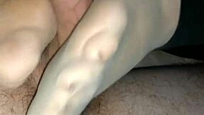 homemade footjob feels so good in those tan stockings teasing every inch sensually