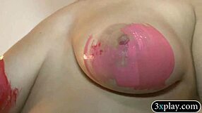 Girls Go Bold with Painted Body Bikinis Flashing for Beach Cash