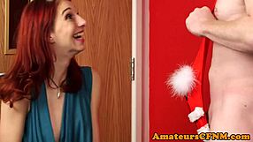 CFNM redhead humiliates man in Christmas mankini with relentless handjob wanking