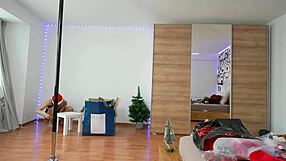 Blonde worships ass while pole dancing Christmas style
