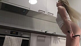 check out this hot chubby blonde housewife's massive natural tits bouncing braless no panties kitchen tease