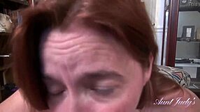 aunt judy's 48 year old texas redhead natasha kneels to suck cock in steamy pov action