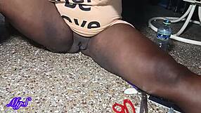 new ebony model teases in bedroom with her smooth shaved curves and seductive housewife vibes