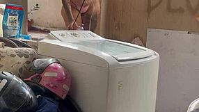woman bares wet pussy and tits washing clothes outside