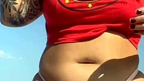 TATTOO FLASH LEADS TO PUSSY REVEAL ON BEACH!
