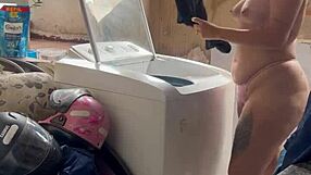 woman bares wet pussy and tits washing clothes outside