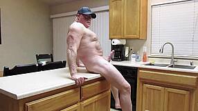 Naked kitchen stretches reveal her sheer homemade flashing secrets