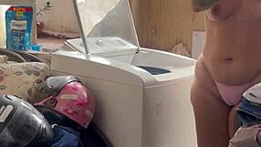 woman bares wet pussy and tits washing clothes outside