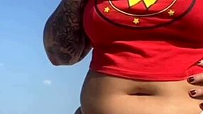 TATTOO FLASH LEADS TO PUSSY REVEAL ON BEACH!