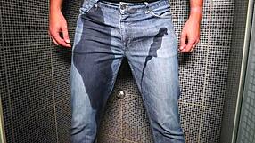 guy soaks jeans with piss then blasts cumshot outdoors