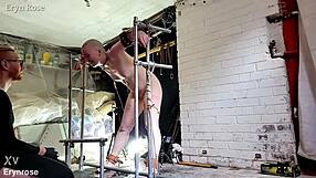 Bound slave in metal restraints begs desperately for pussy orgasm release!