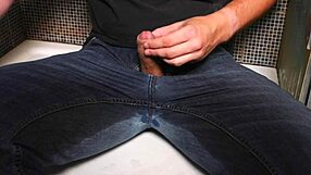 guy soaks jeans with piss then blasts cumshot outdoors