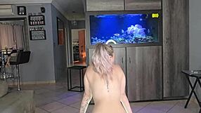 Curvy Tattooed Blonde Babe Dances Nude Close-Up with Big Pussy Lips Exposed