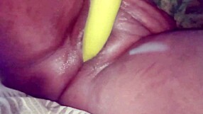 Desi bhabhi stuffs brinjal deep in shaved pussy for wet orgasm