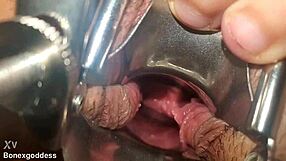 close up speculum stretches her pussy wide open