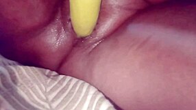 Desi bhabhi stuffs brinjal deep in shaved pussy for wet orgasm