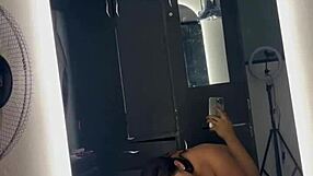 Curvy neighbor watches video then fucks before bathroom mirror