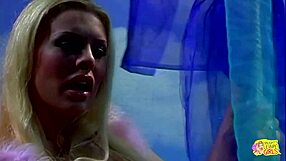 gorgeous blonde masturbates before brunette straps on for wild cowgirl pussy pounding