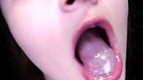 Satina Swallows NINE Cumshots Through Gloryhole Onto Tongue And Face