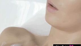 big titted latvian teen simone sheds robe for steamy pussy-revealing romantic bath soak