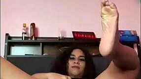 Horny Latina Stretches Pussy on Bed