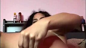 Horny Latina Stretches Pussy on Bed