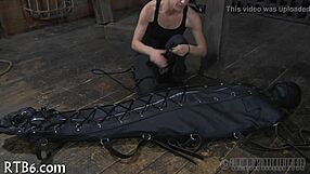 in the garage the restrained girl faces her punishment step by step
