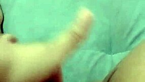 her wet pussy throbs as she fingers hard gushing with raw horny moans