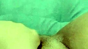 her wet pussy throbs as she fingers hard gushing with raw horny moans