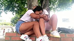 outdoor park caresses turn into horny mutual masturbation kisses