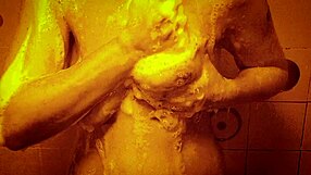 Slow motion shower drips over sexy wet tits and perky nipples