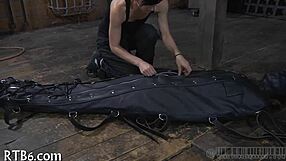 in the garage the restrained girl faces her punishment step by step