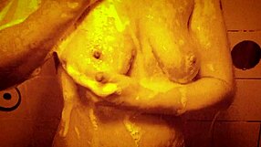 Slow motion shower drips over sexy wet tits and perky nipples