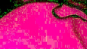 real couple shares a tender intimate moment under red lights