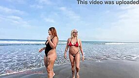 check out this slutty milf flashing pussy and ass on beach with her hot friend trailer
