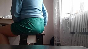 Stressed secretary fingers herself to orgasm under office desk