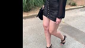 her in leather mini dress and heels ready to tease you slowly