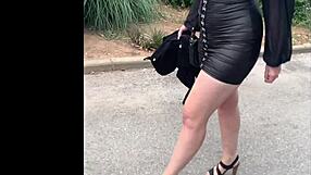 her in leather mini dress and heels ready to tease you slowly