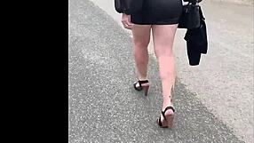 her in leather mini dress and heels ready to tease you slowly