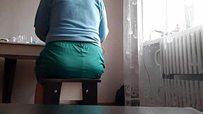 Stressed secretary fingers herself to orgasm under office desk